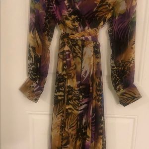 Multi Colored sheered dress for almost any occasion. Slip underneath as well.